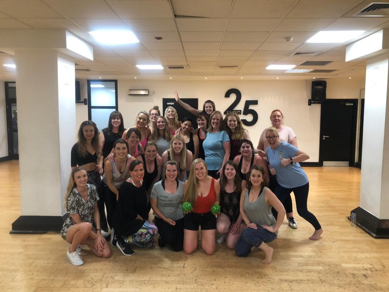 Group enjoying Dirty Dancing hen party with passionate lift moves and mambo choreography