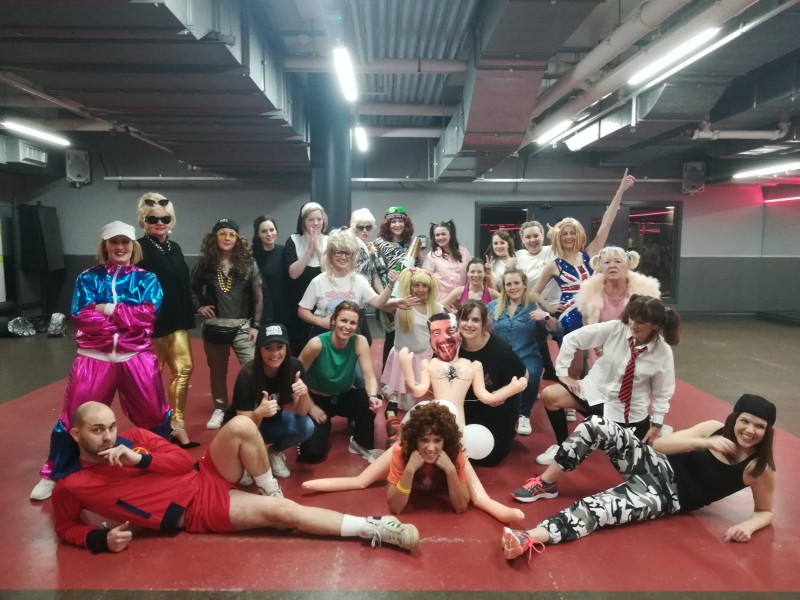 Street dance class - dancers performing urban choreography and breaking moves